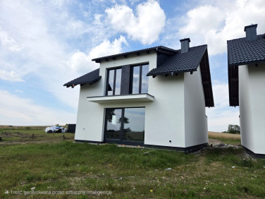 Dom z balkonem