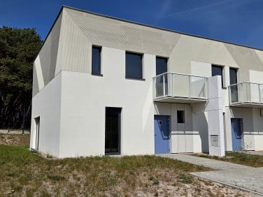 Dom z balkonem