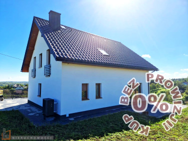 Dom z balkonem