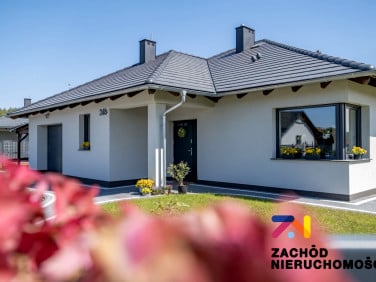 Dom z balkonem