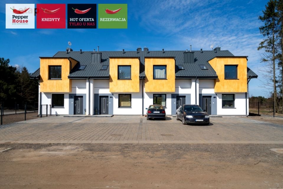 Dom z balkonem