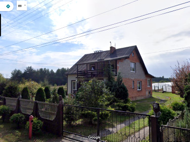 Dom z balkonem