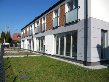 Dom z balkonem