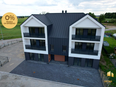 Dom z balkonem