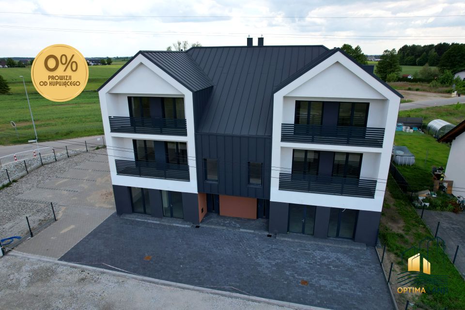 Dom z balkonem