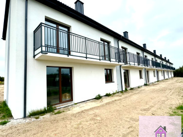 Dom z balkonem