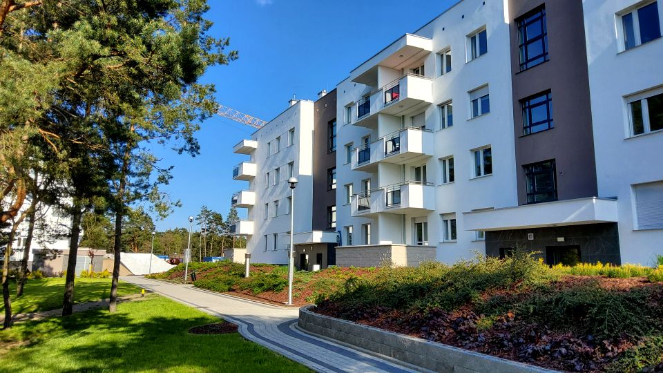 Mieszkanie blok mieszkalny nad jeziorem