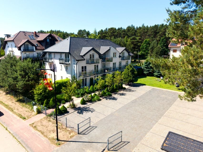 Dom z balkonem