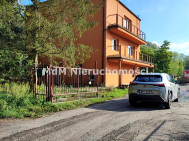 Zabudowana działka Byków