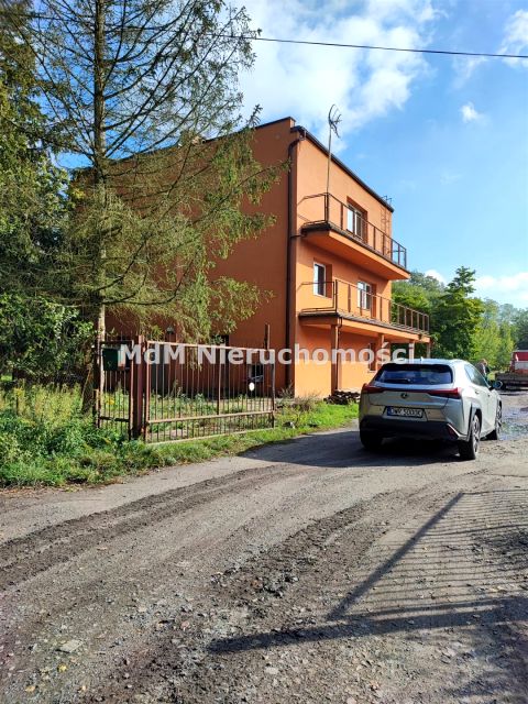 Zabudowana działka Byków