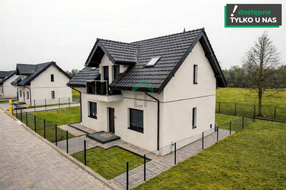 Dom z balkonem