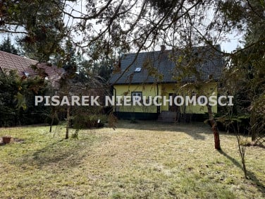 Dom z balkonem