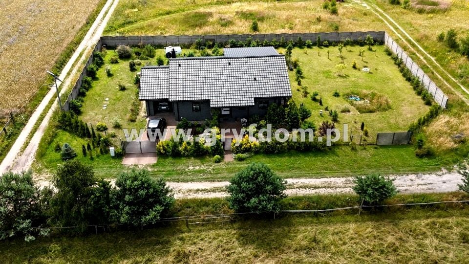 Dom z balkonem