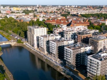 Mieszkanie blok mieszkalny nad rzeką