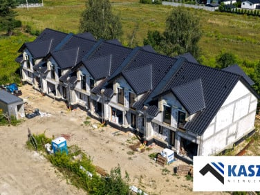 Dom z balkonem