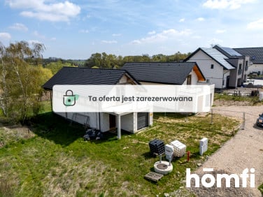 Dom z balkonem